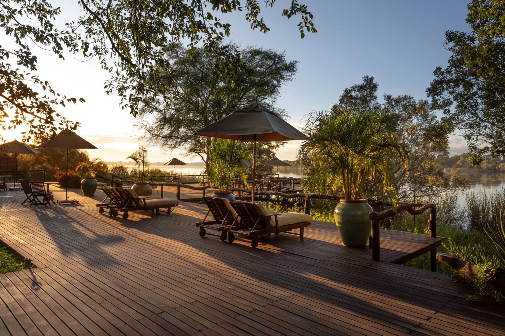 ascot private journal Photography- Mukwa River Lodge - the main deck at sunset, Zambezi below, elephants crossing